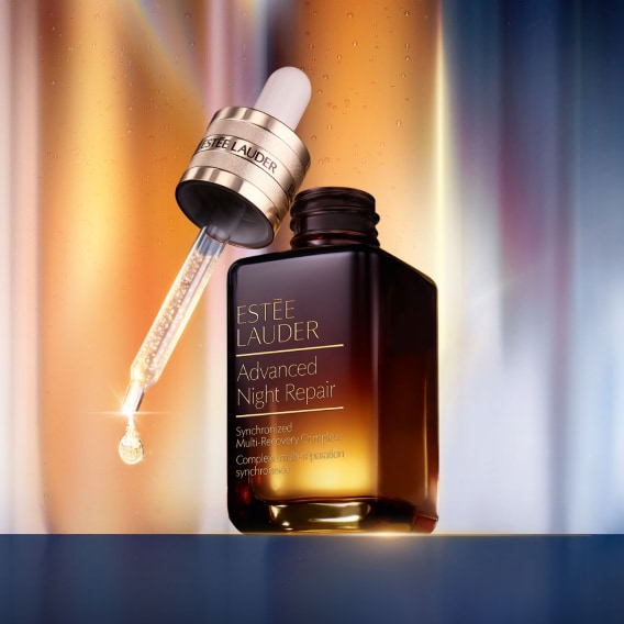 Revitalizing Supreme+ day & night moisturisers on navy background