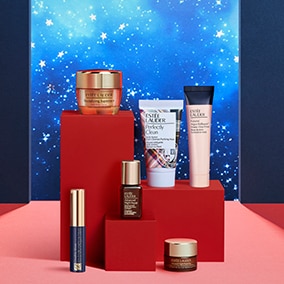 6 Estee Lauder products with a red and blue starry background