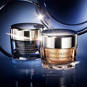 Revitalizing Supreme+ day & night moisturisers on navy background