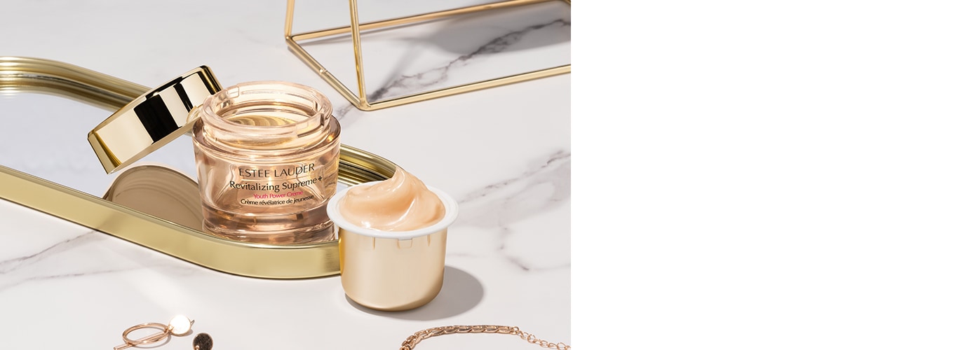 Revitalizing Supreme+ moisturiser and refill on a vanity