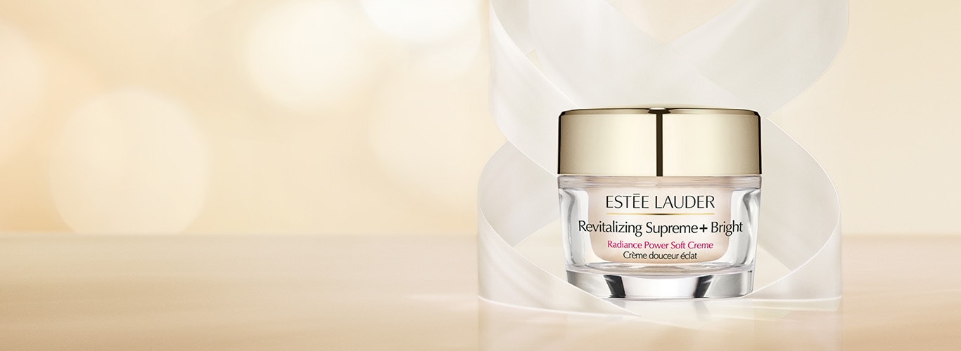 New Revitalizing Supreme+ Bright Soft Creme on beige background