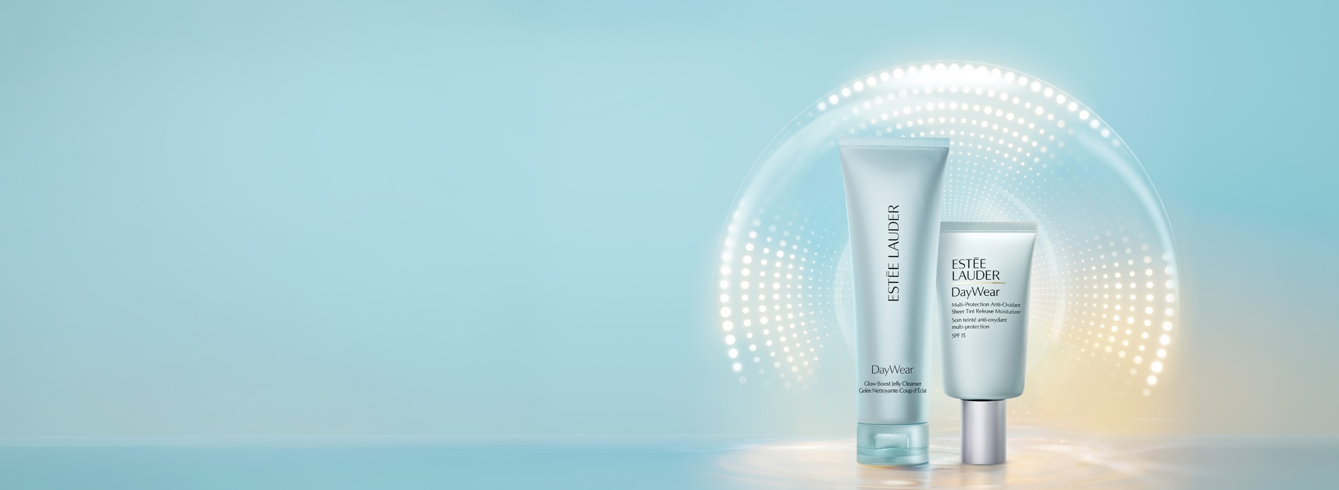 Estée Lauder DayWear products on a pale blue background