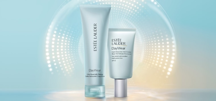 Estée Lauder DayWear products on a light blue background