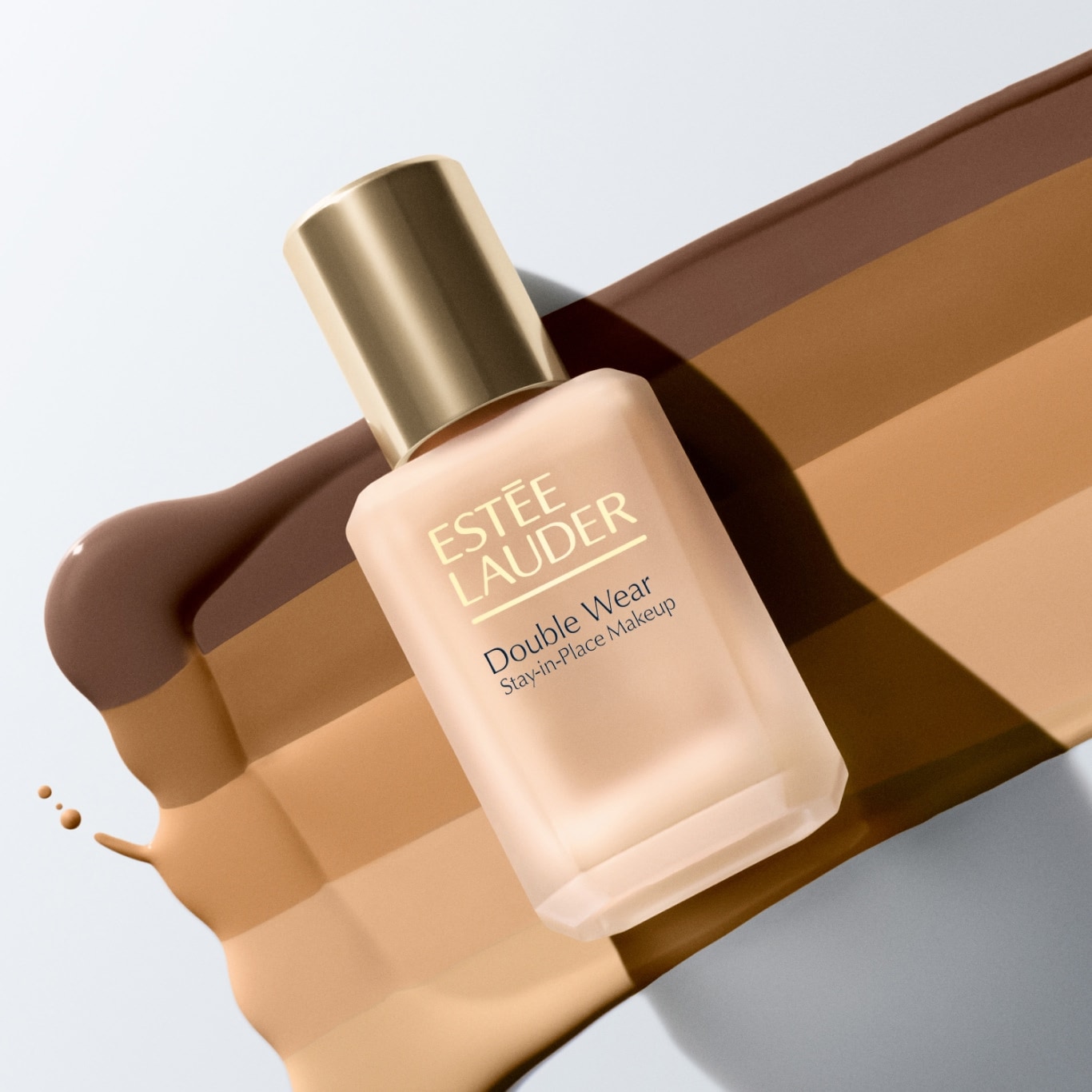 Different foundation smooshes, showing the difference in texture and available shades