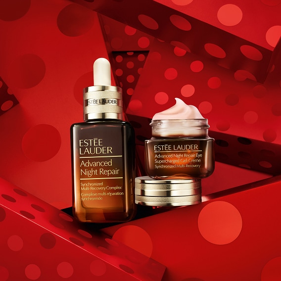 Revitalizing Supreme+ day & night moisturisers on navy background