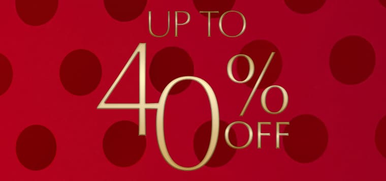 Up to 40% off on a red polka dot background