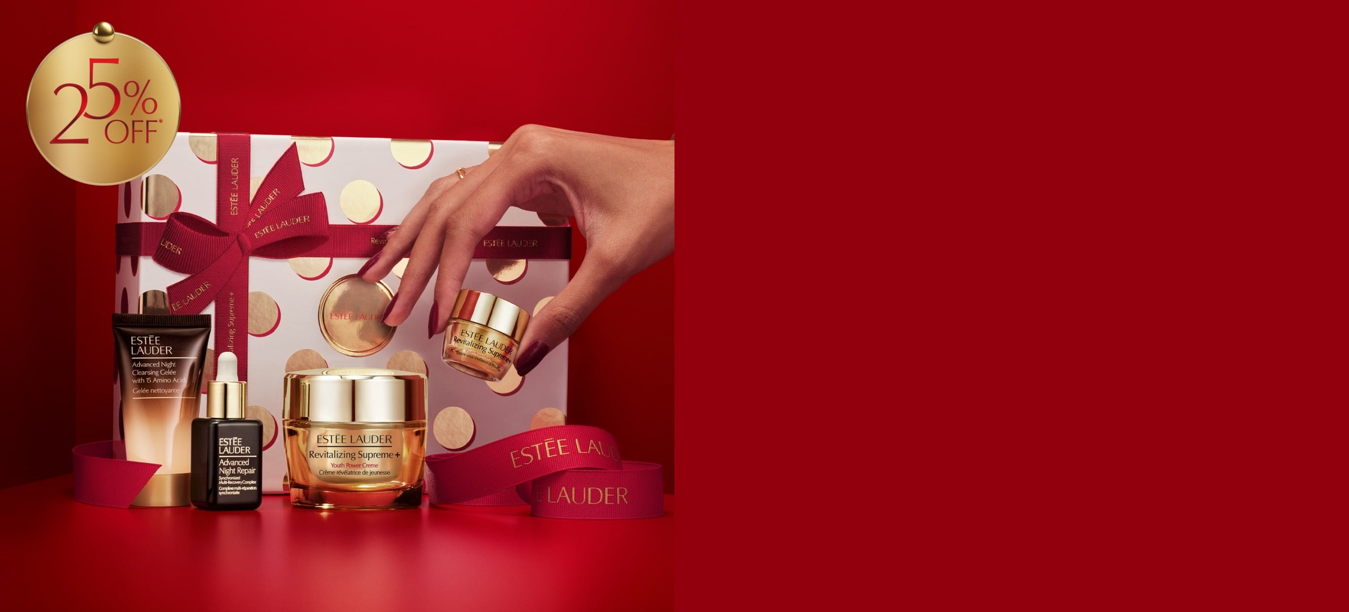 A set of Estée Lauder products on a red background.