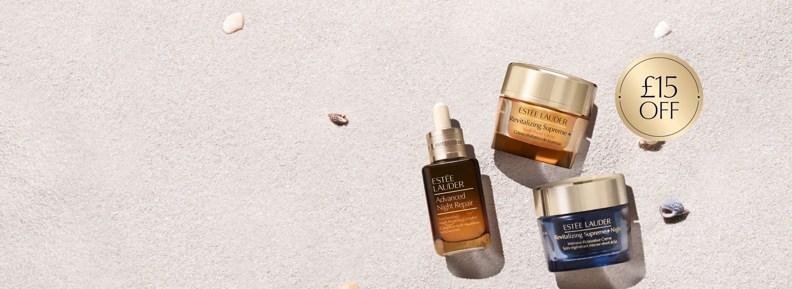 Estee Lauder serum and moisturiser products on a neutral background