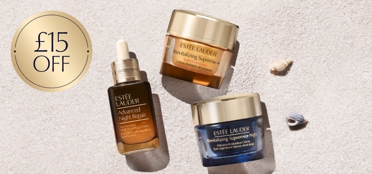 Estee Lauder moisturiser and serum products on a neutral background