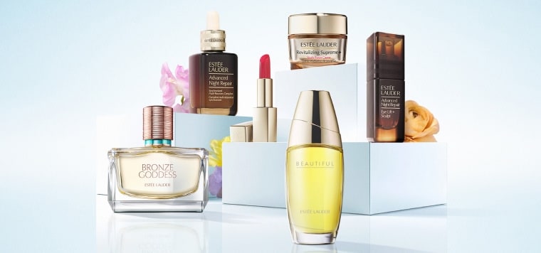 Estée Lauder products on a light blue background