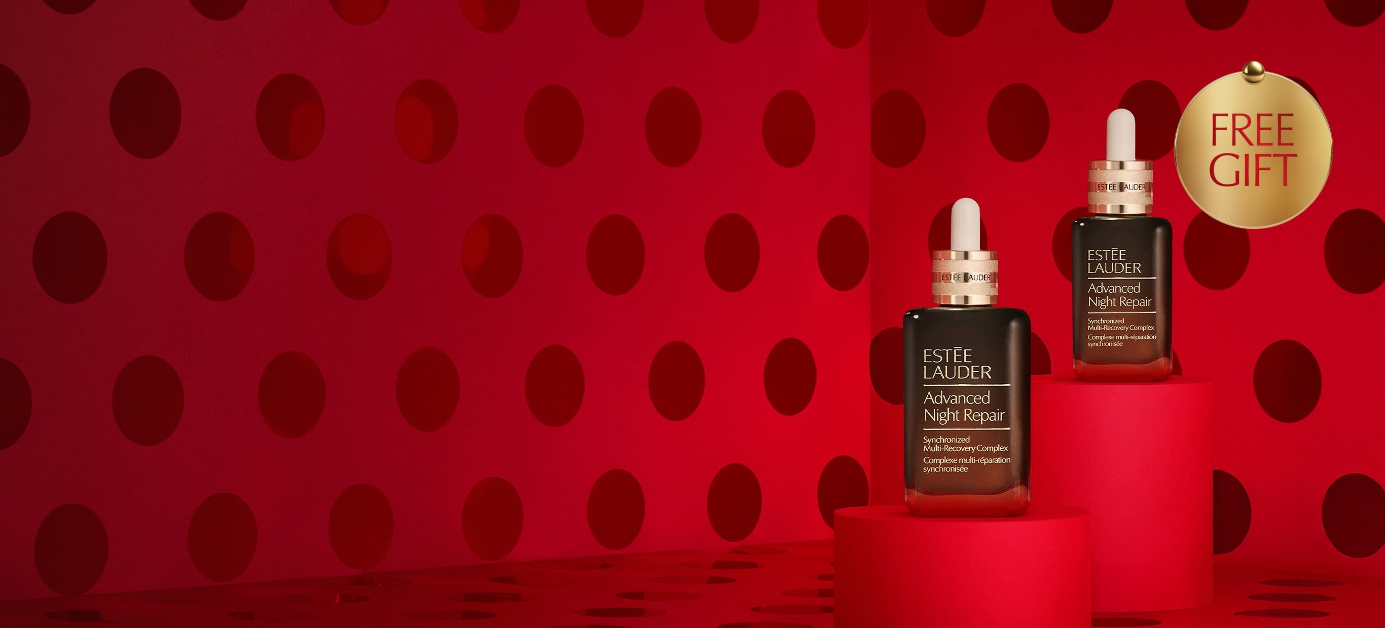 Estée Lauder advanced night repair on a red background.