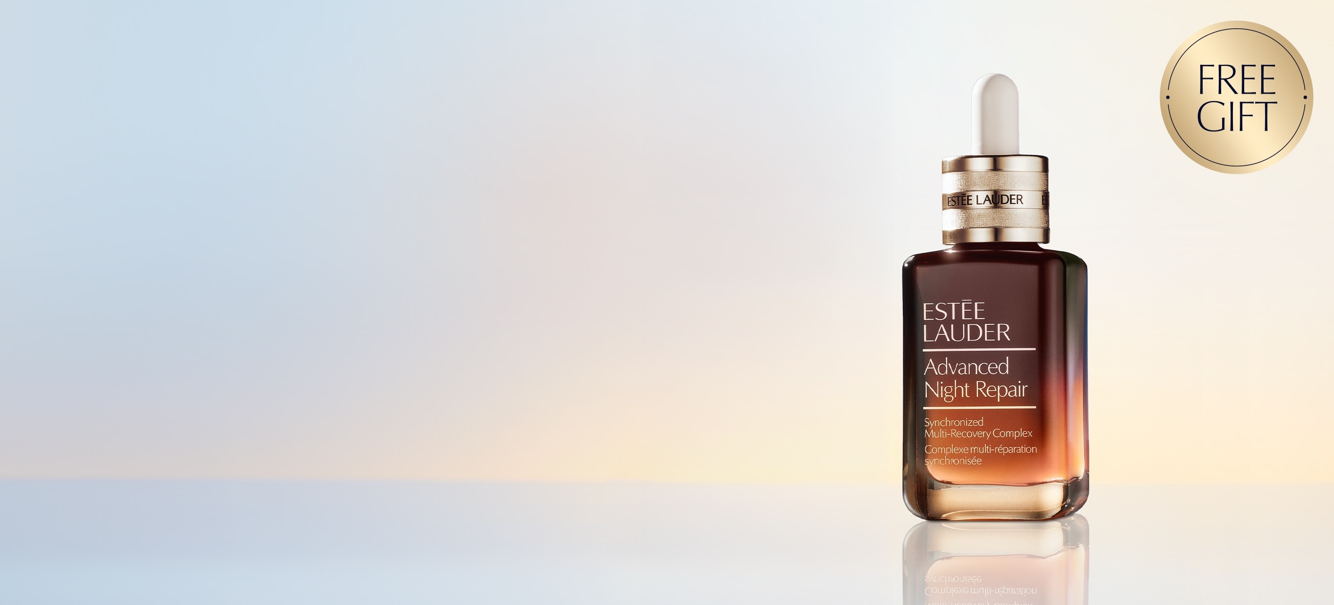 An Estée Lauder Advanced Night Repair on a pale blue background