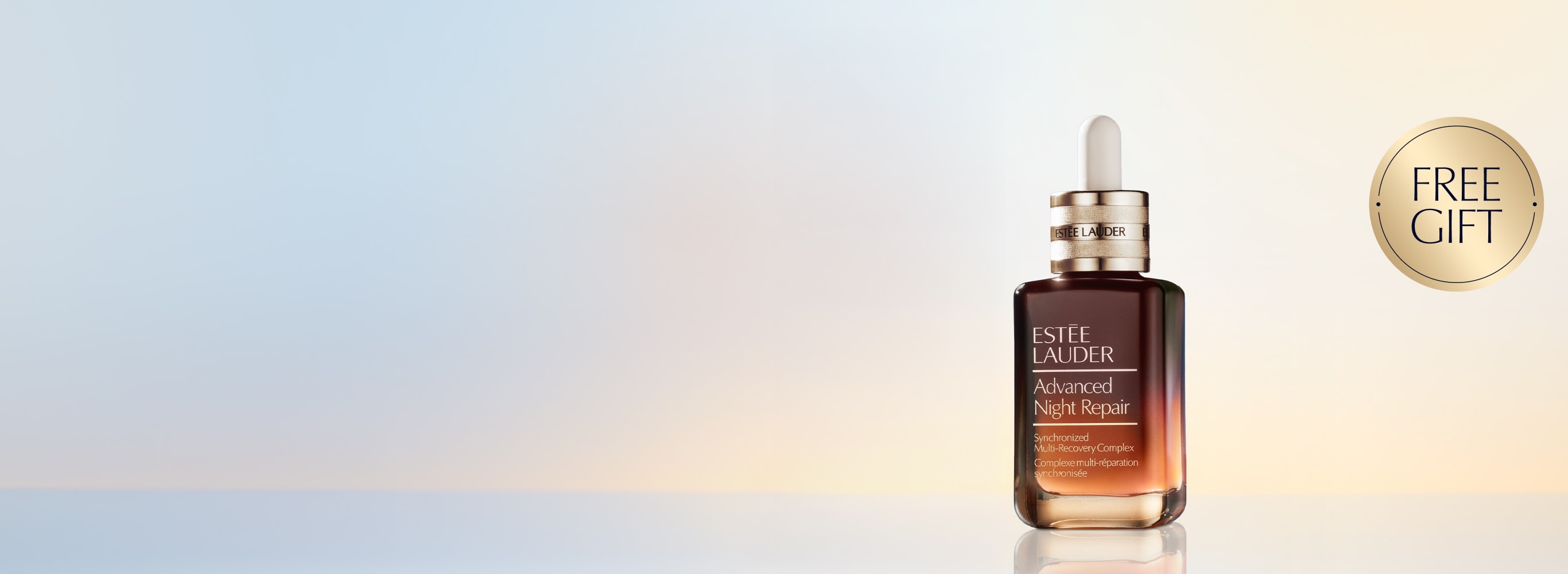 An Estée Lauder Advanced Night Repair on a pale blue background