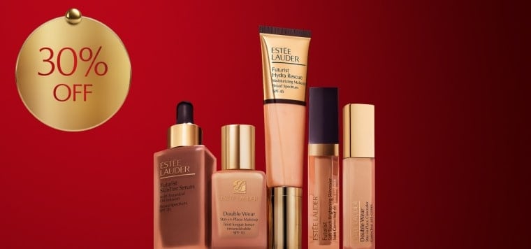 Estée Lauder foundations and concealers on a red background.
