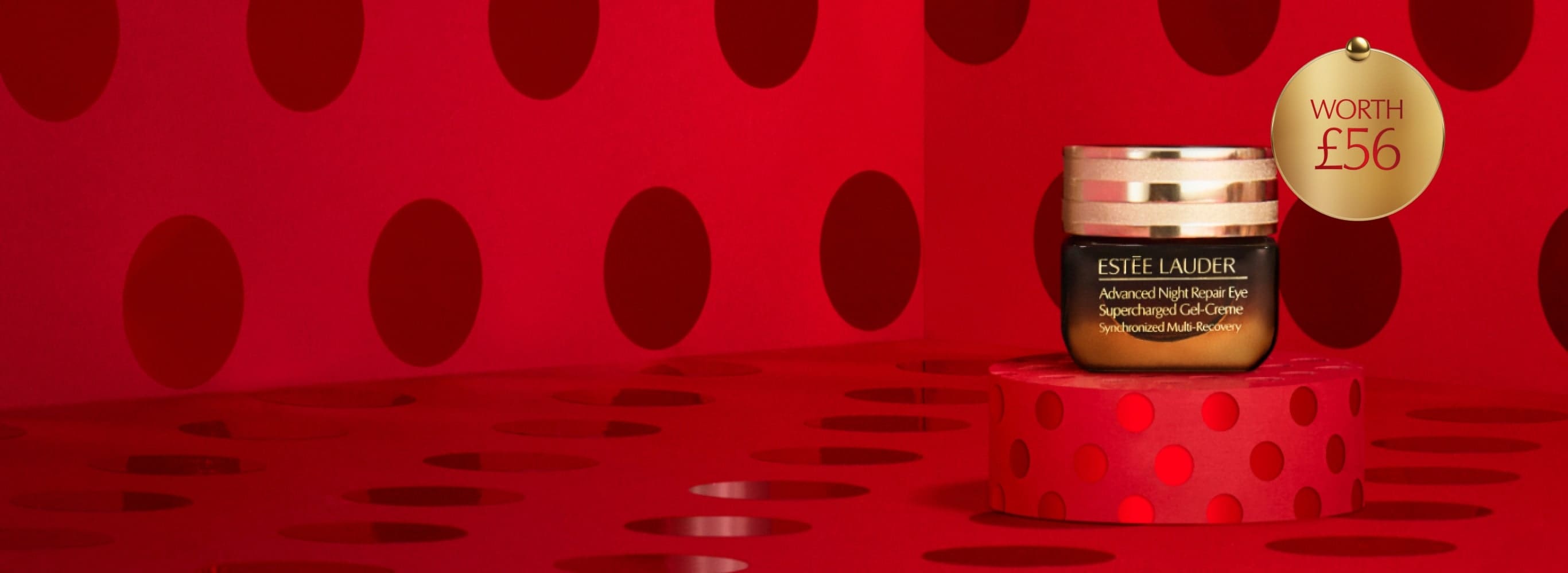 An Advanced Night Repair Supercharged Eye Gel-Creme on a red background.