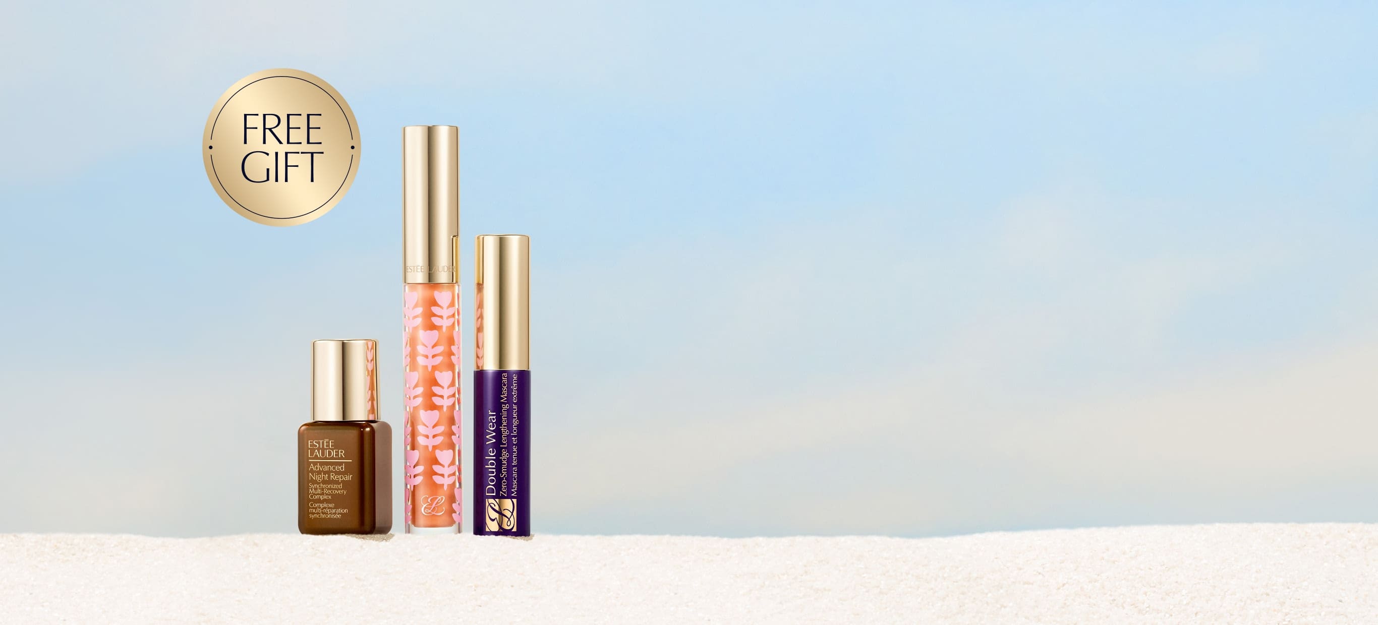 Estee Lauder products set on a blue background