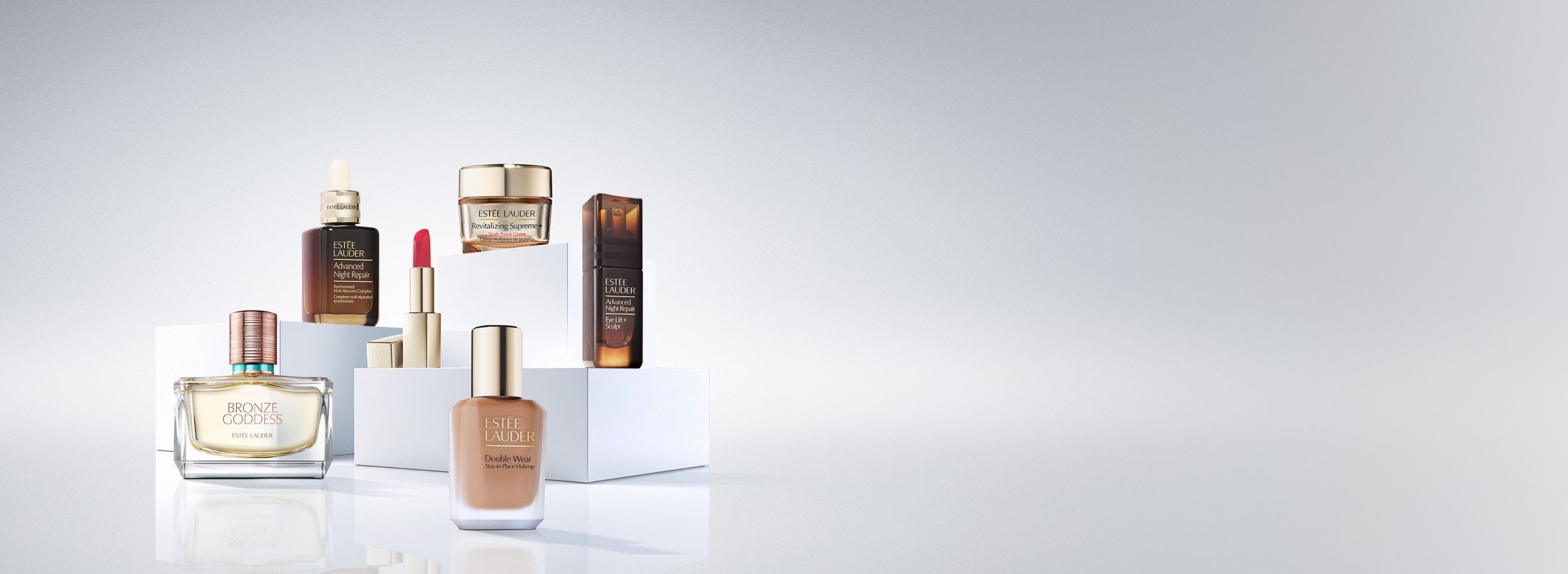 A selection of Estee Lauder products on a white background