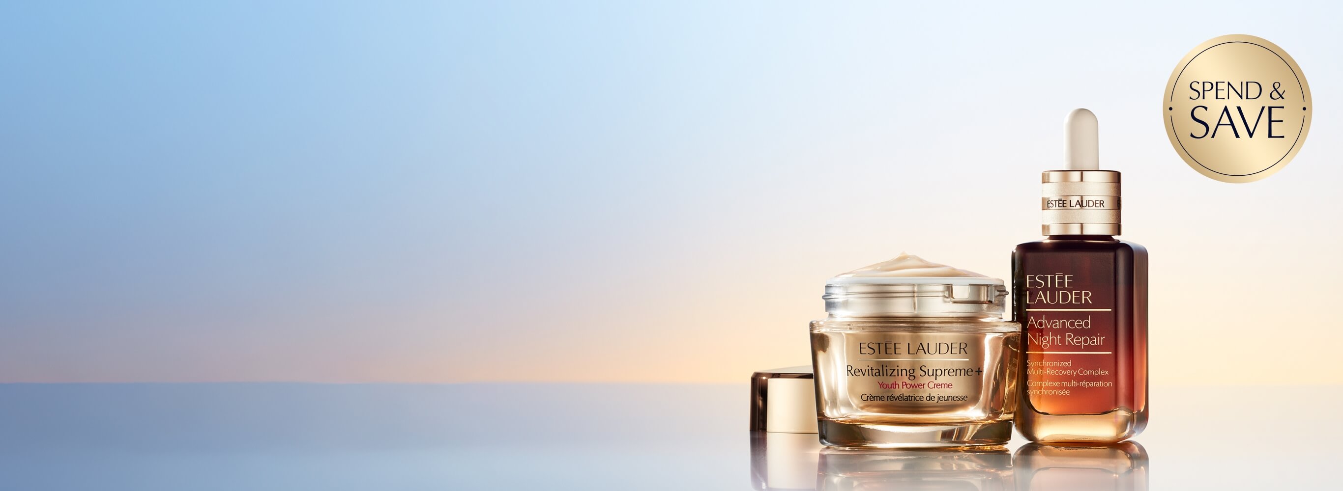 Estée Lauder skincare products on a pale blue background