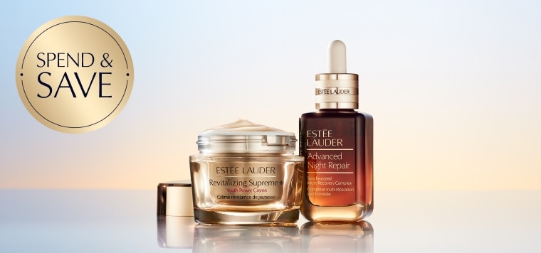 Estée Lauder skincare products on a light blue background