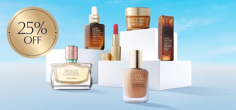 A selection of Estee Lauder products on a blue background