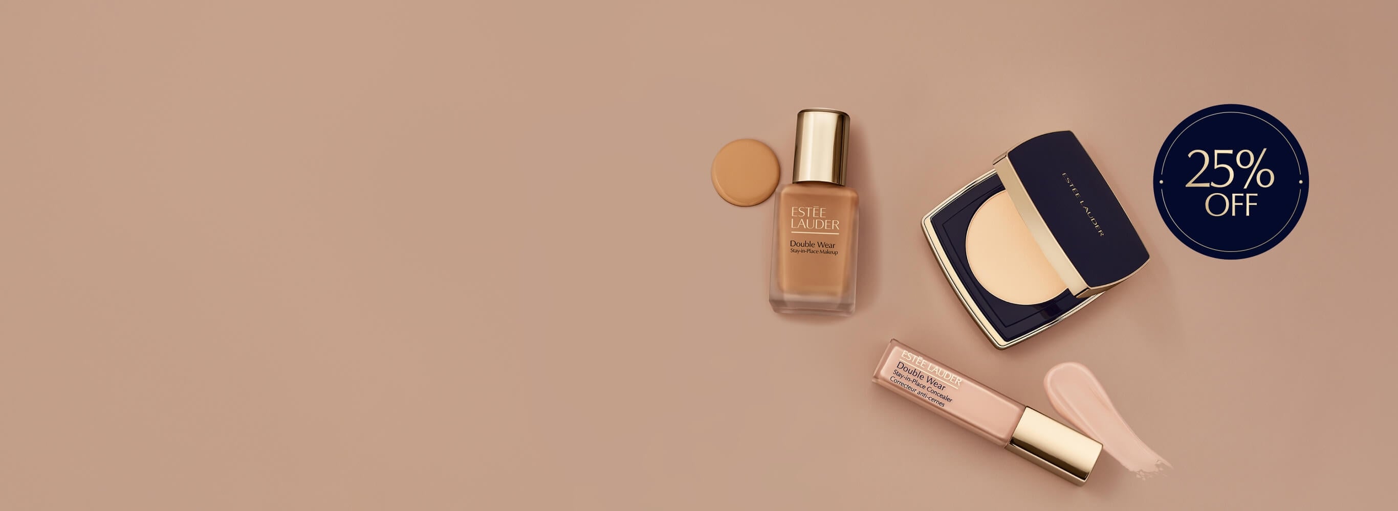 Estee Lauder foundation and concealer products on a neutral background