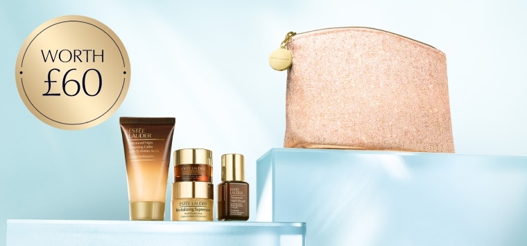 Estee Lauder gift with Estee Lauder products on a blue background