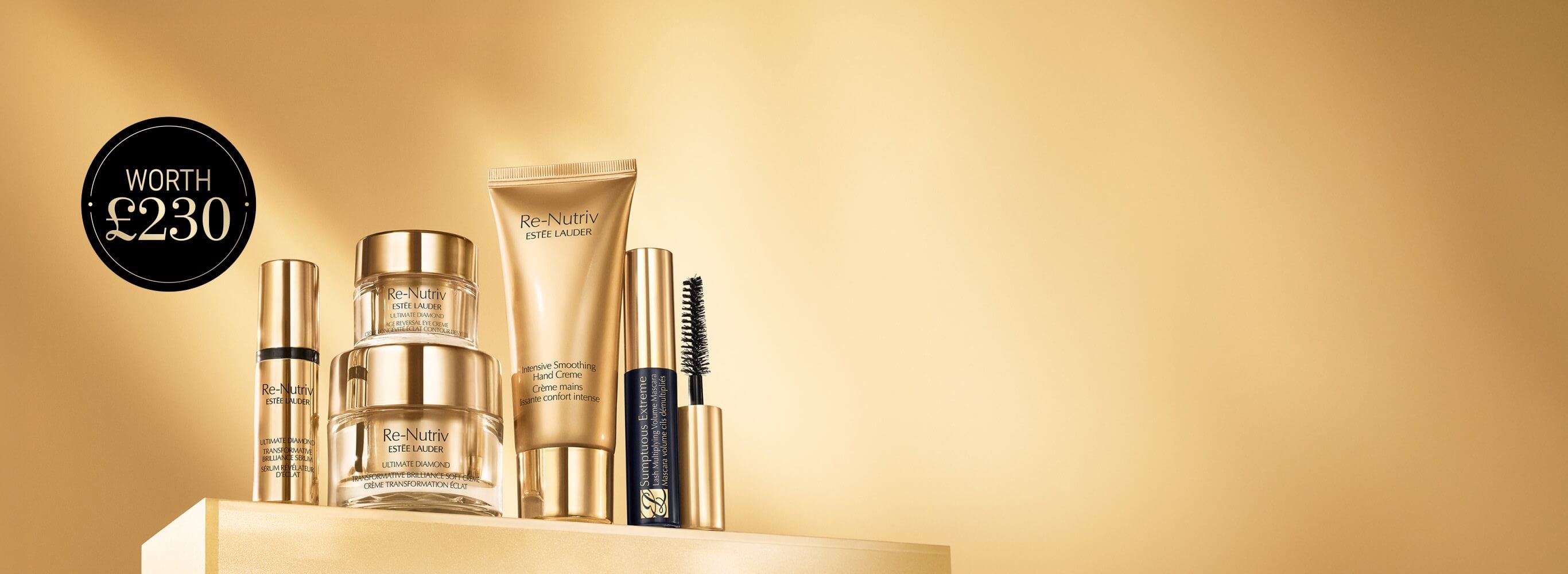 A selection of Estee Lauder Re-Nutriv products on a golden background