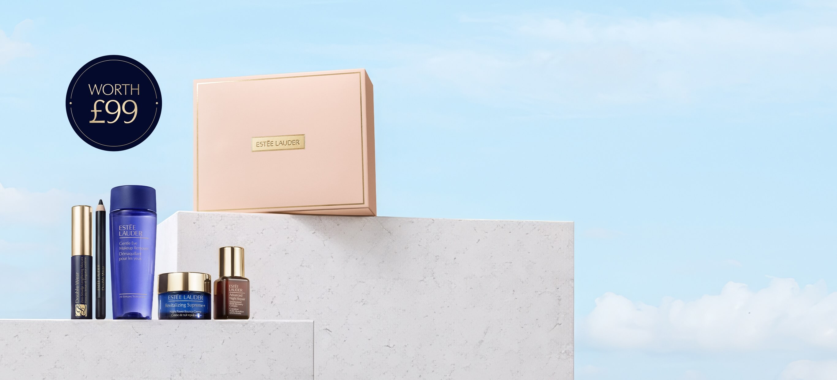 A selection of Estee Lauder products on a blue background