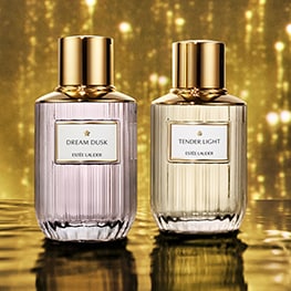 Two luxury collection fragrances on a gold background