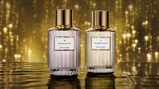 Two luxury collection fragrances on a gold background