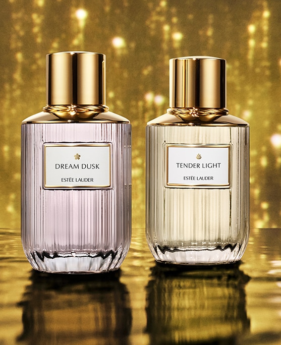 Two Luxury fragrances with a gold background