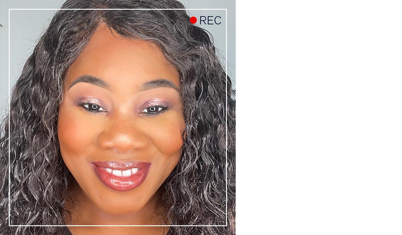 Melissa Clovey smiling with a glamourous makeup look.