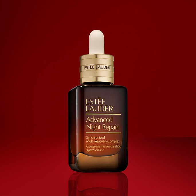 An Advanced Night Repair Serum on a red background