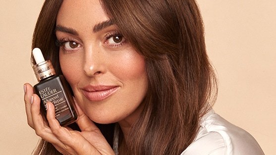 Alex holding Advanced Night Repair Serum