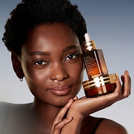 photo of woman doing her skincare routine