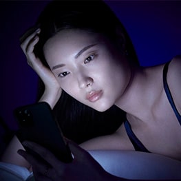 Women Scrolls on her Mobile
