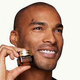 photo of man applying eye care