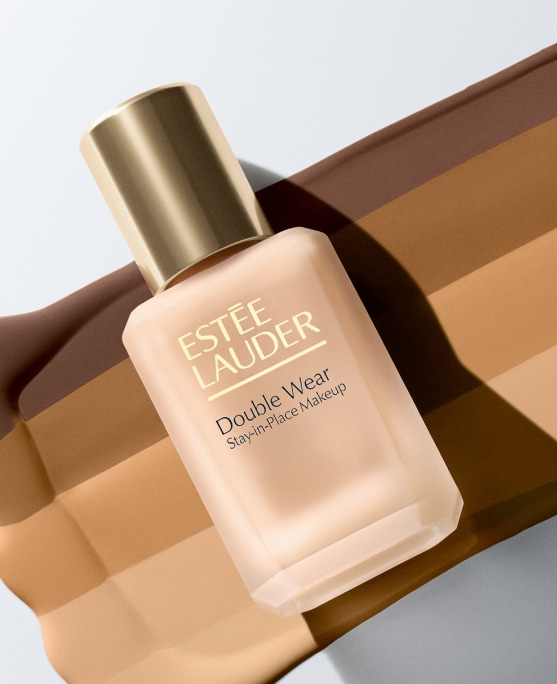 photo of woman applying estee lauder morning skincare routine