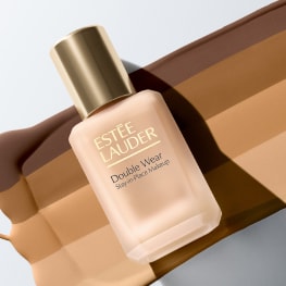 photo of woman applying estee lauder morning skincare routine