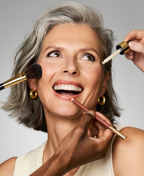 photo of woman applying estee lauder morning skincare routine