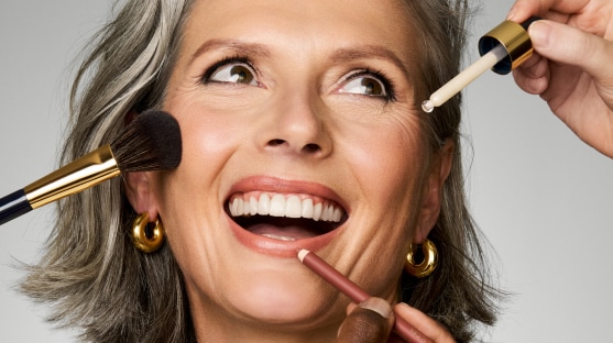 photo of woman applying estee lauder morning skincare routine