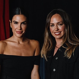 Makeup artist Hannah Martin standing next to female model