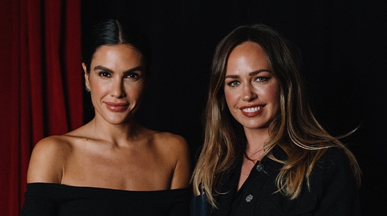Makeup artist Hannah Martin standing next to female model