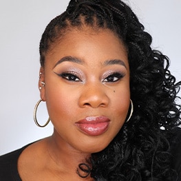 Pro Artist Melissa Clovey in glamorous makeup. 