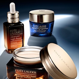Advanced Nihgt Repair Serum and Advanced Night Repair Overnight Treatment on a dark blue background