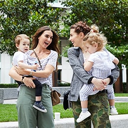 Sam and Gemma from This is Mothership with their two children. 