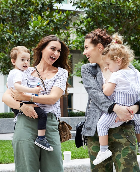 Sam and Gemma from This is Mothership with their two children. 