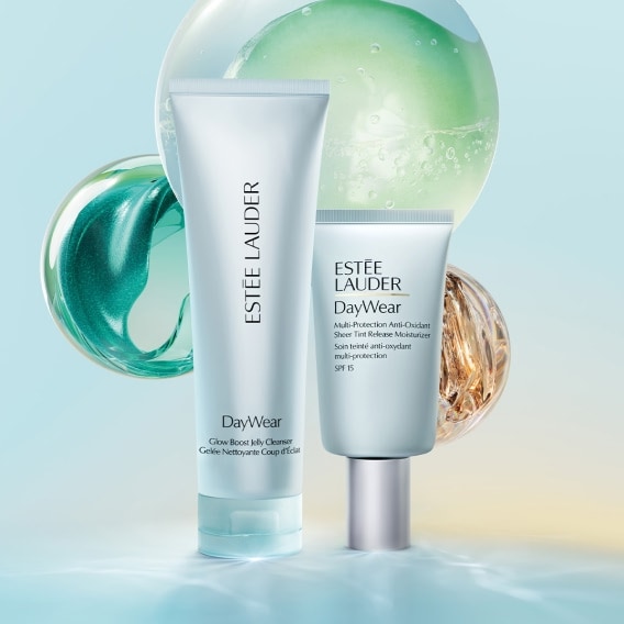 Revitalizing Supreme+ day & night moisturisers on navy background