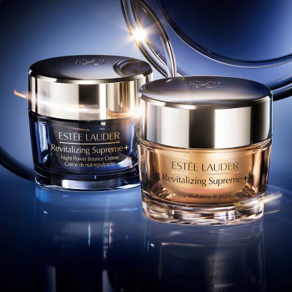 Revitalizing Supreme+ day & night moisturisers on navy background