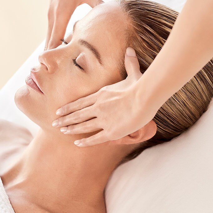 Woman enjoys relaxing ultimate skincare treatment